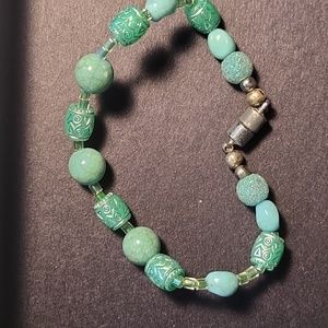 Green cloisinee beaded bracelet.